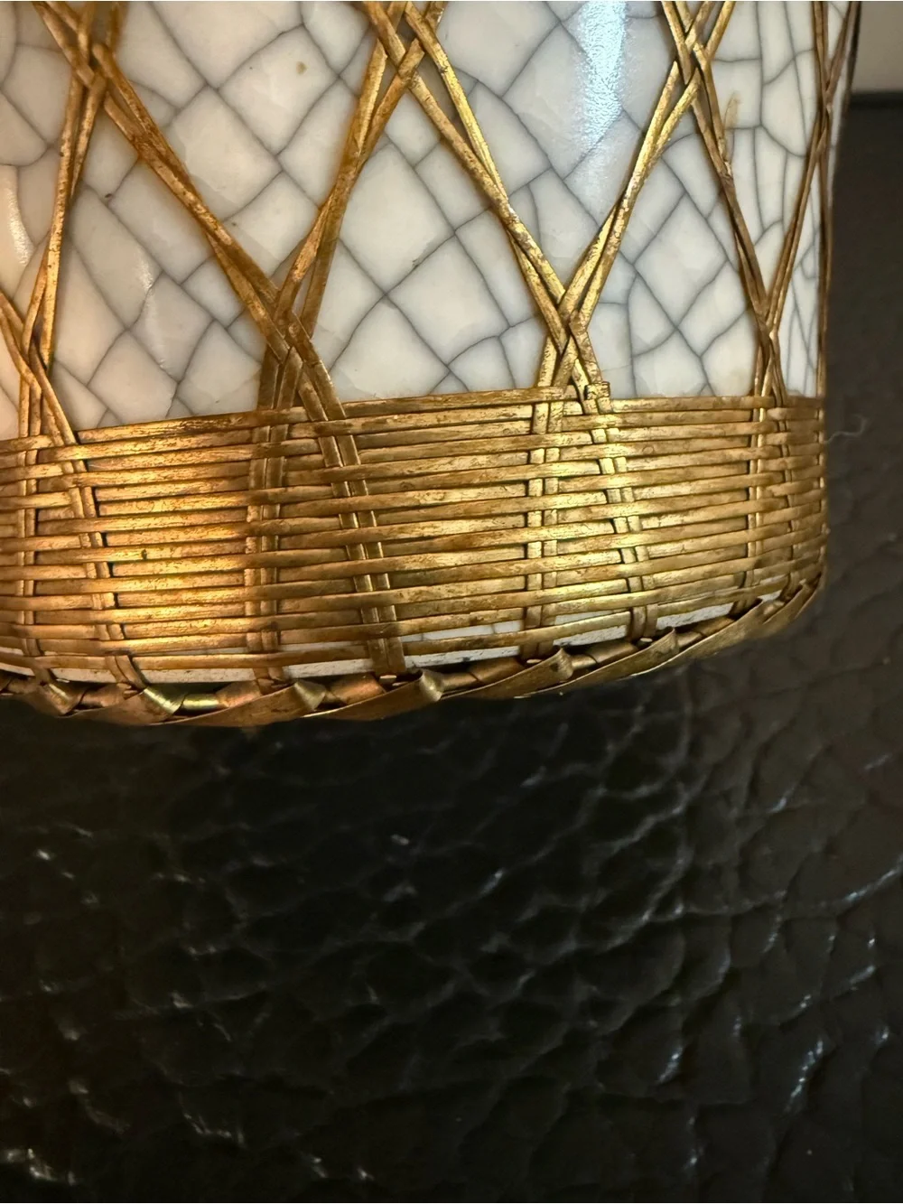 Japanese pottery vase craquelure glaze and a basketweave metal overlay.